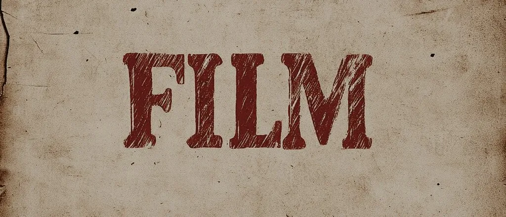 The word “FILM” in dark red slab-serif letters on stained, creased beige paper