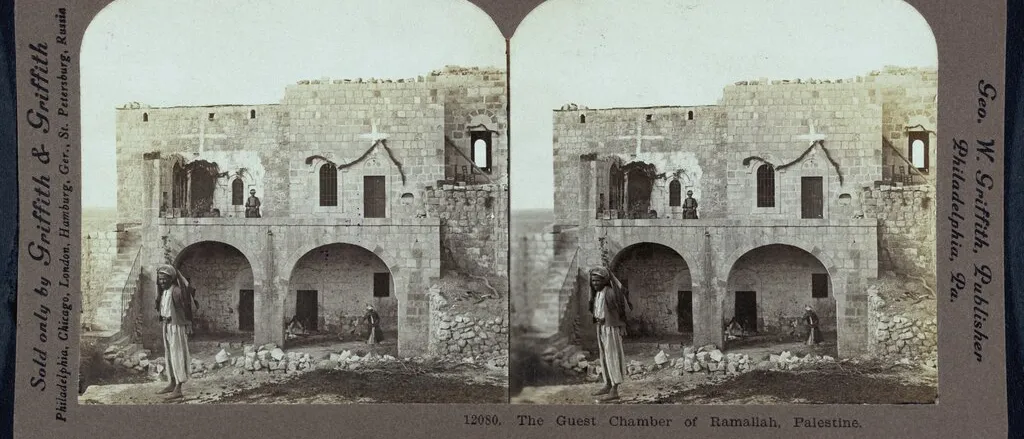 Stereograph of a two-storey stone house with arched ground-floor rooms in Ramallah, about 1905