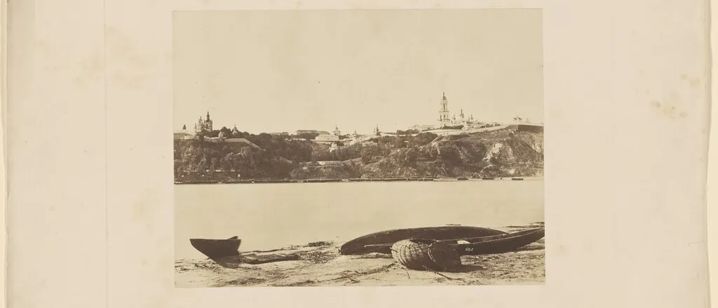 1852 photograph of the Great Pecherskaya Monastery in Kyiv seen across the Dnieper, boats on the near bank